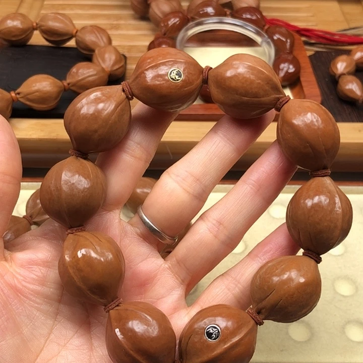 手串橄榄核梅林铁核22 X28带金银标精品