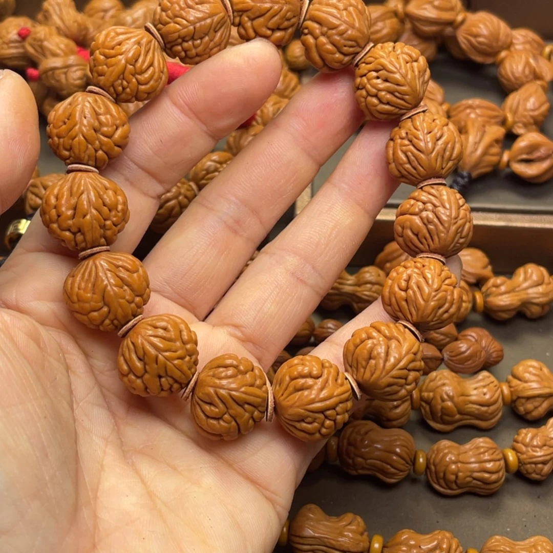 用***9桃核手串龙纹桃核18