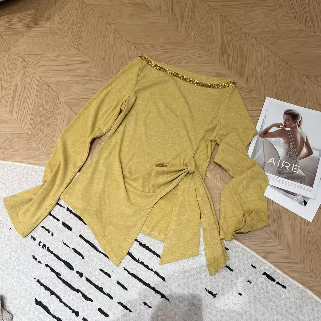 YUE 58691 春季亮片一字肩系带款长袖时尚上衣