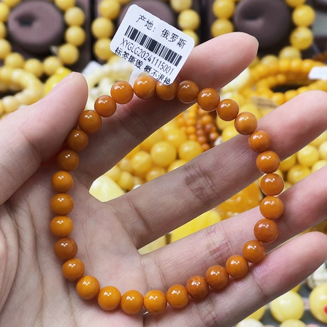 未镶嵌琥珀珠宝奇石@**Y6+mm浓蜡鸡油红 瑕