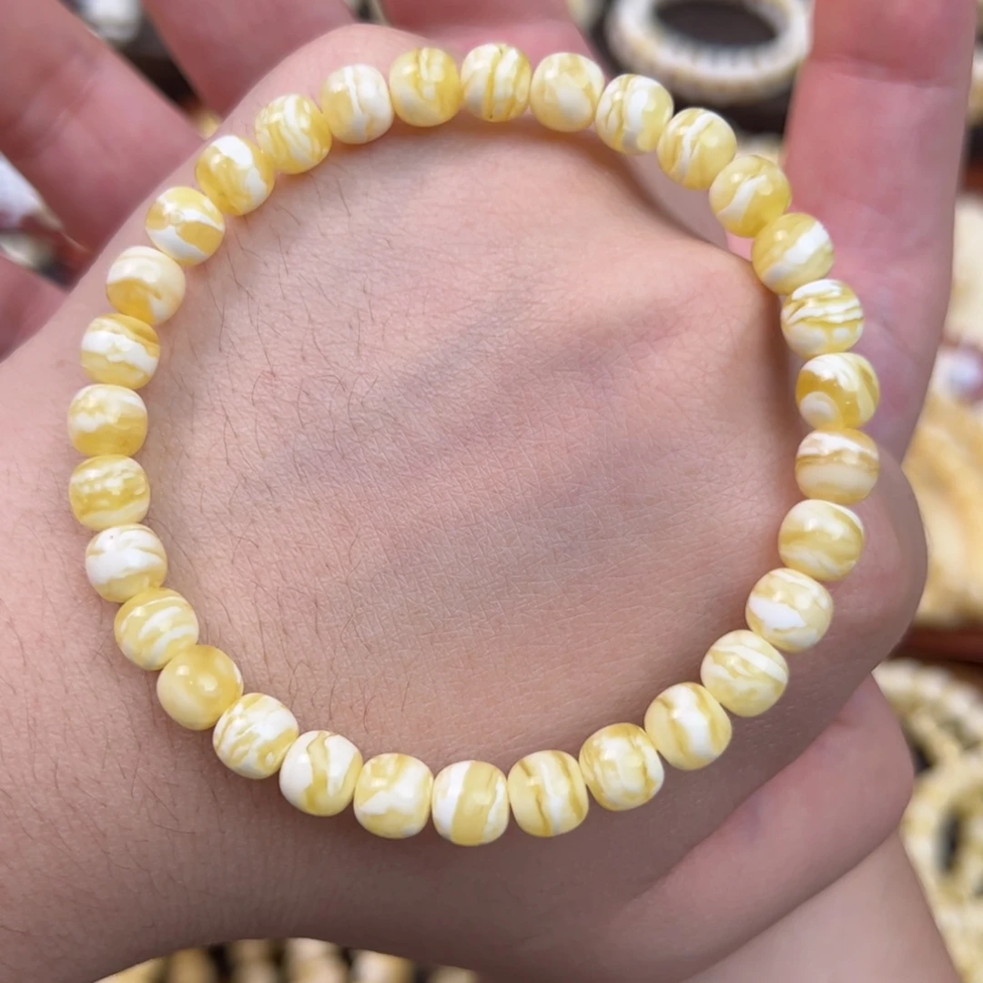 琥珀未镶嵌手串7mm金瓷白虎皮纹