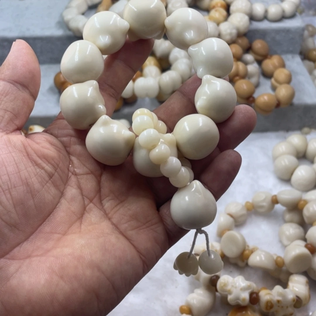 吊坠菩提根/象牙果全品象牙果白猫头手串卡22
