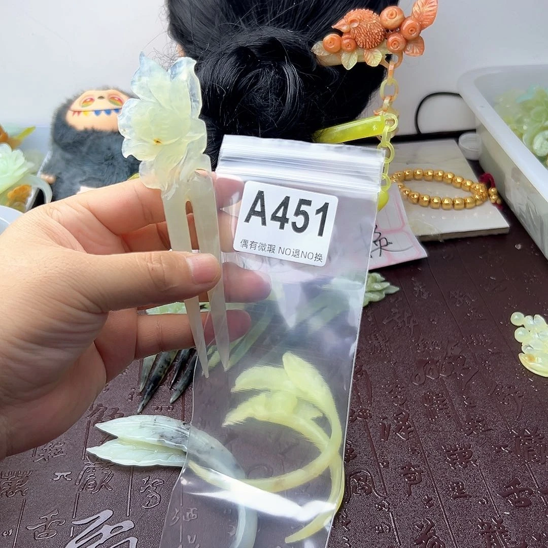 合金蛇纹石玉发饰翎*