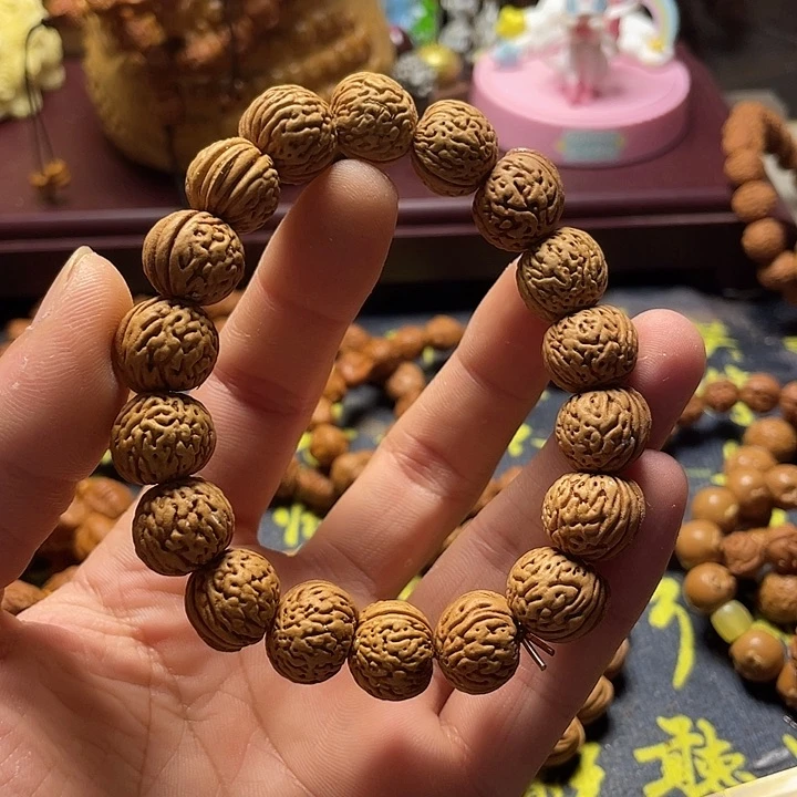 翘**狗脑纹桃核素核手串