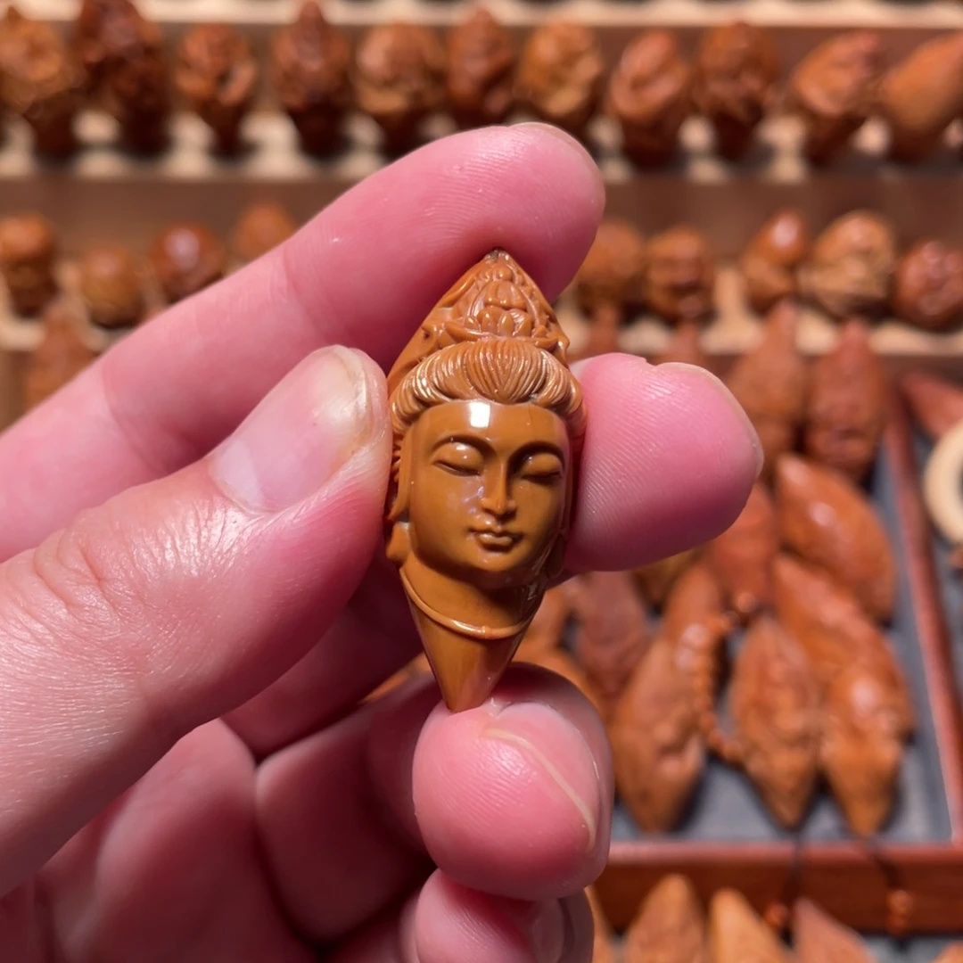 橄榄核吊坠观音头