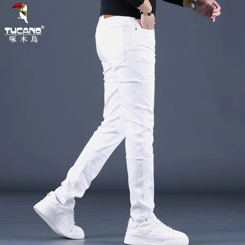 啄木鸟2025春季新款白色牛仔裤男韩版潮流百搭小脚弹力休闲裤子男