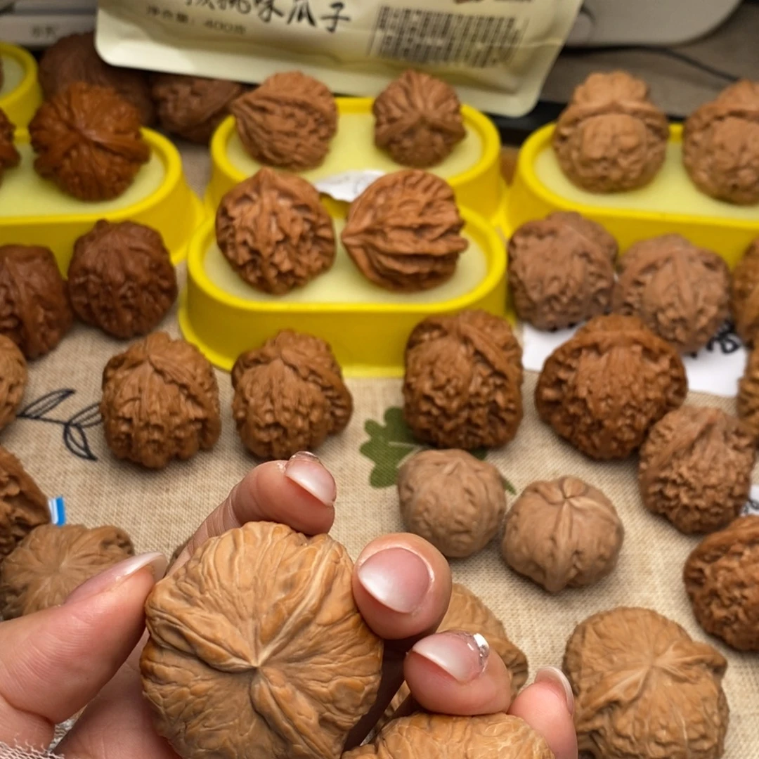 梦***落文玩核桃元宝奔…………