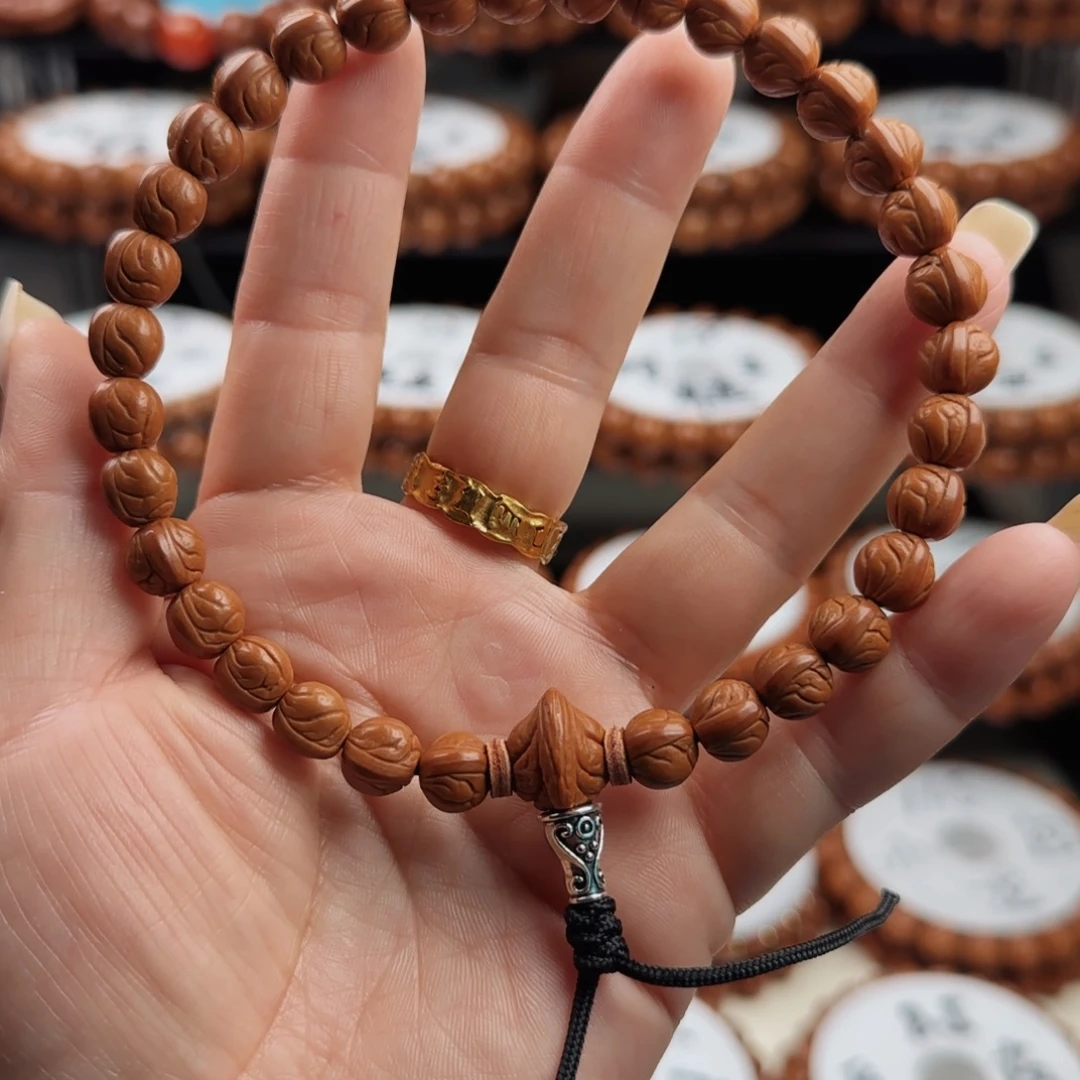 桃核手串元宝手持