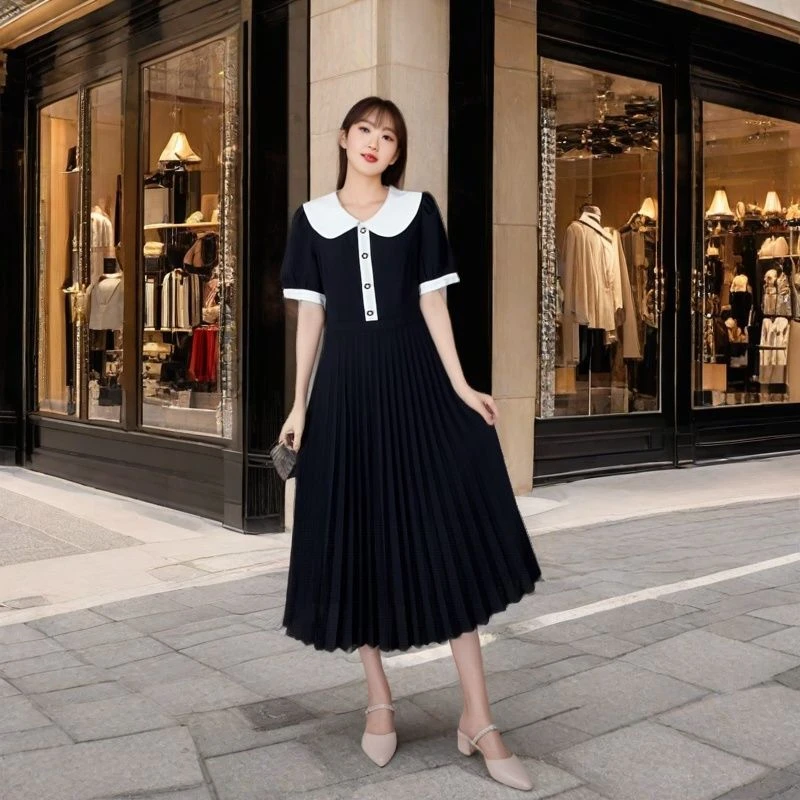 洋气百褶夏季娃娃领连衣裙显瘦气质小个子时尚黑色收腰中长款裙子