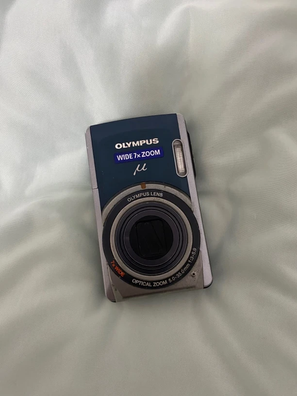 9新 Olympus/奥林巴斯 u7020蓝色1200w像素ccd数码相机（屏幕瑕疵）