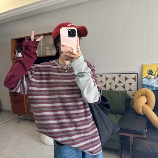 qiqi/琦琦推荐韩版宽松时尚减龄条纹拼接假两件长袖T上衣休闲百搭