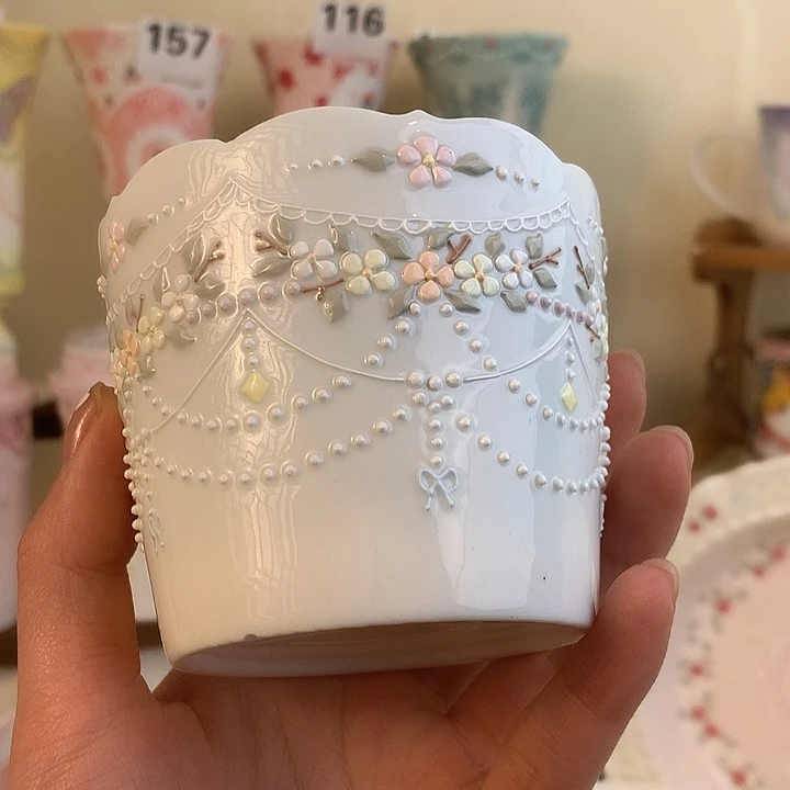 微瑕福利立体釉花口杯