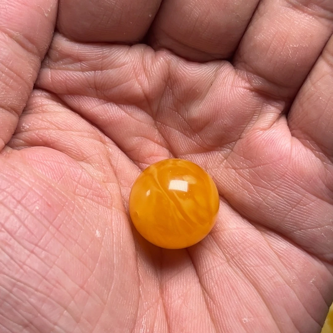 琥珀未镶嵌裸石蜜蜡焦皮橘红19.9毫米