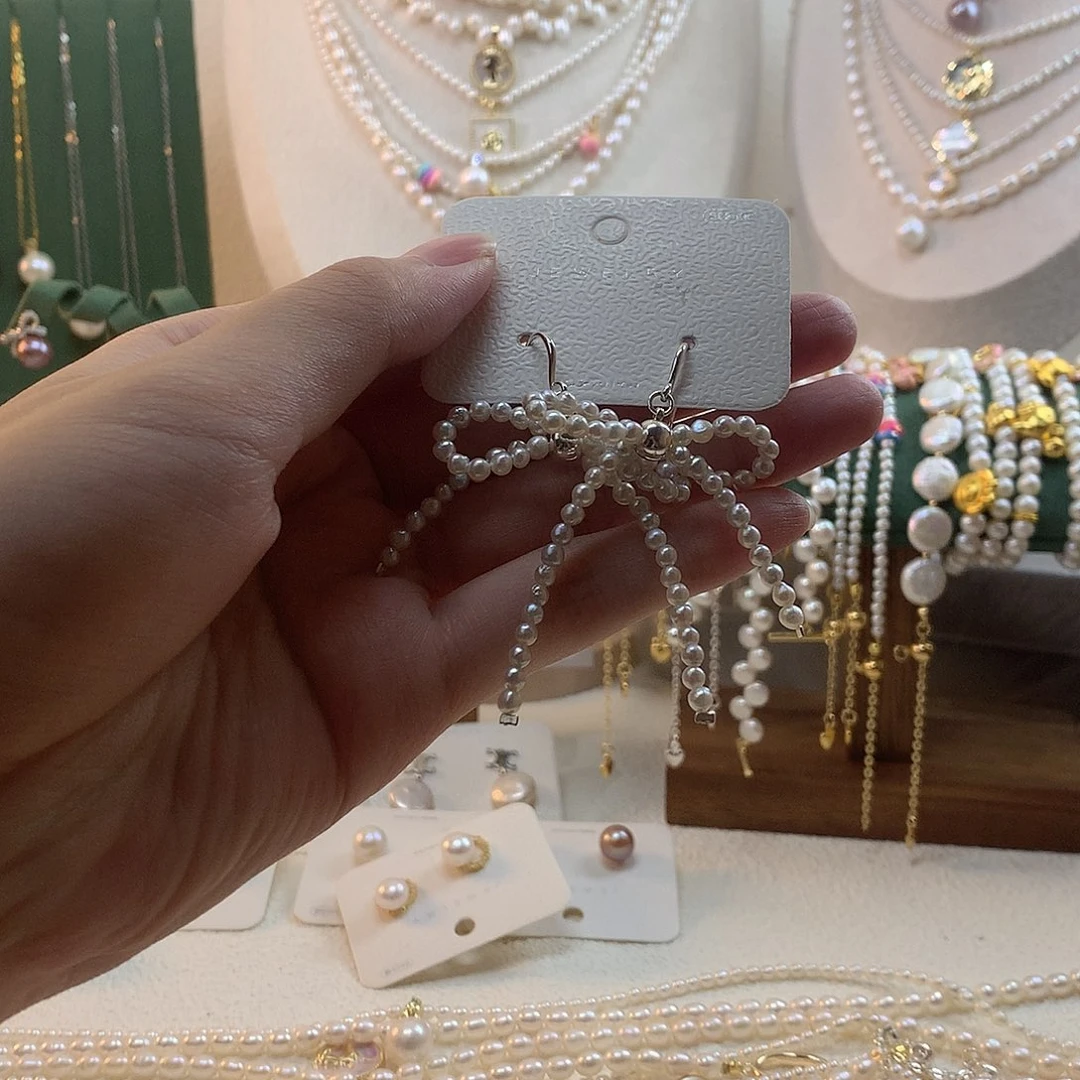 银S925镶嵌淡水珍珠蝴蝶结耳钩