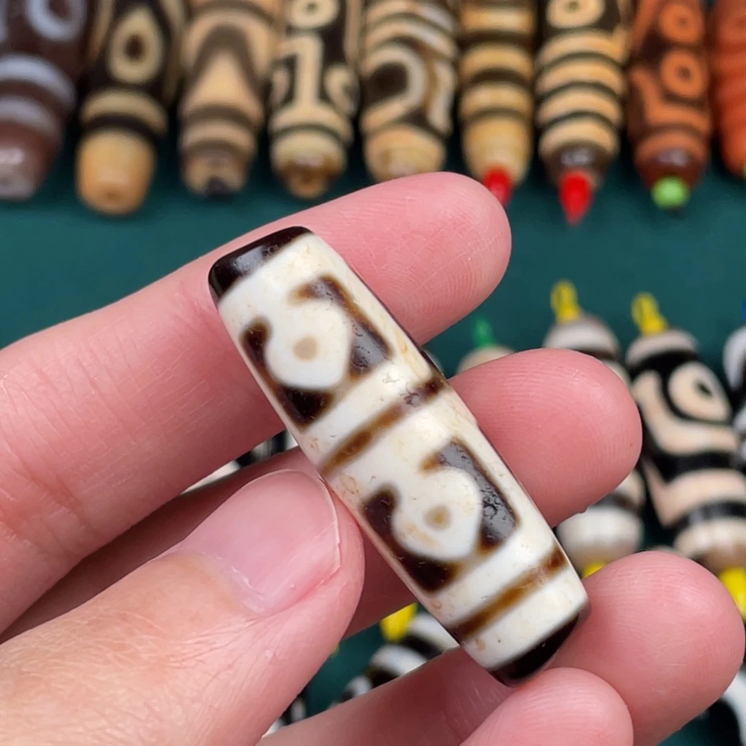 玛瑙/玉髓裸珠39.7 12.3 行运菩提四眼图腾