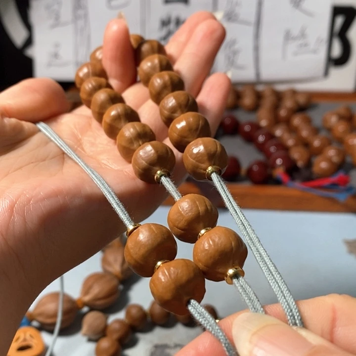 橄榄核手串3131精品蒜头小铁核16+2颗