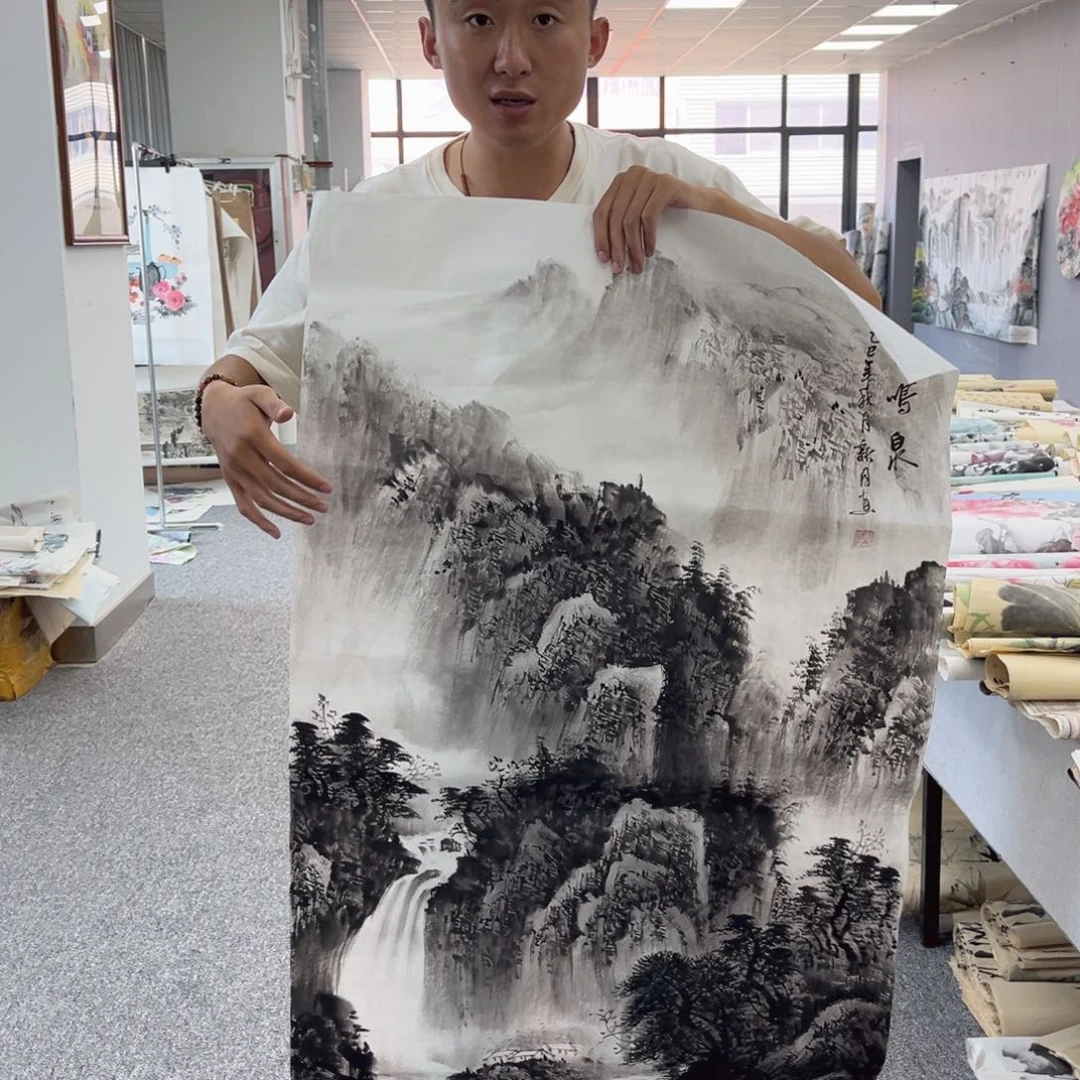 国画卖字画的小男孩