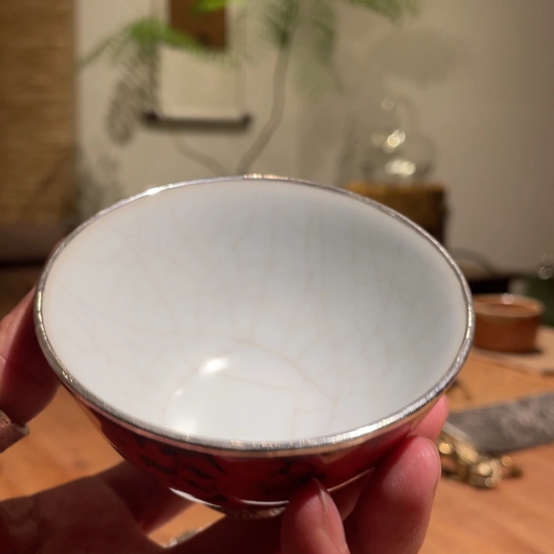 亚***生红色杯子带银底111