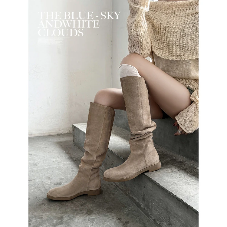 米兰 【高奢】慵懒老钱风2.5cm平底显瘦显腿直过膝长靴堆堆西部靴女