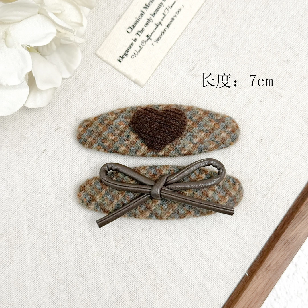 BAOSHATI/宝莎缇F-179秋冬美拉德针织爱心蝴蝶结BB夹