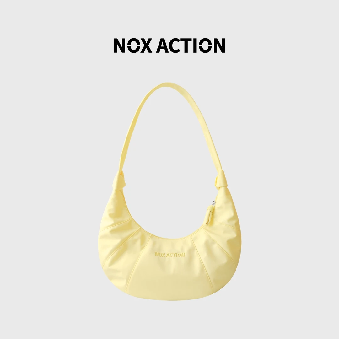 现为 NOX ACTION 柔软漫游系列牛角包 尼龙包大容量斜挎包女单肩