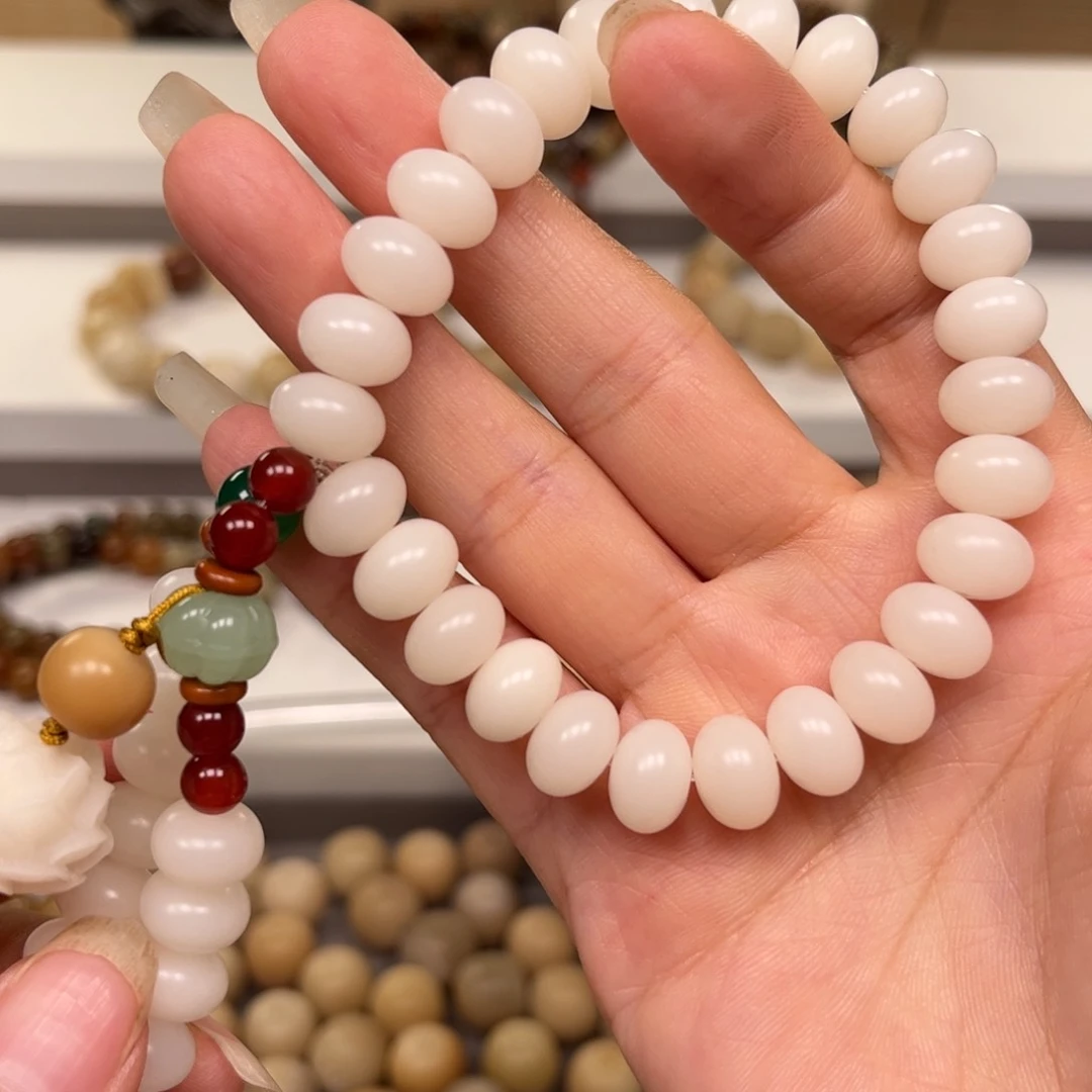 狸***咪白玉菩提吊坠算盘奶白单圈一条