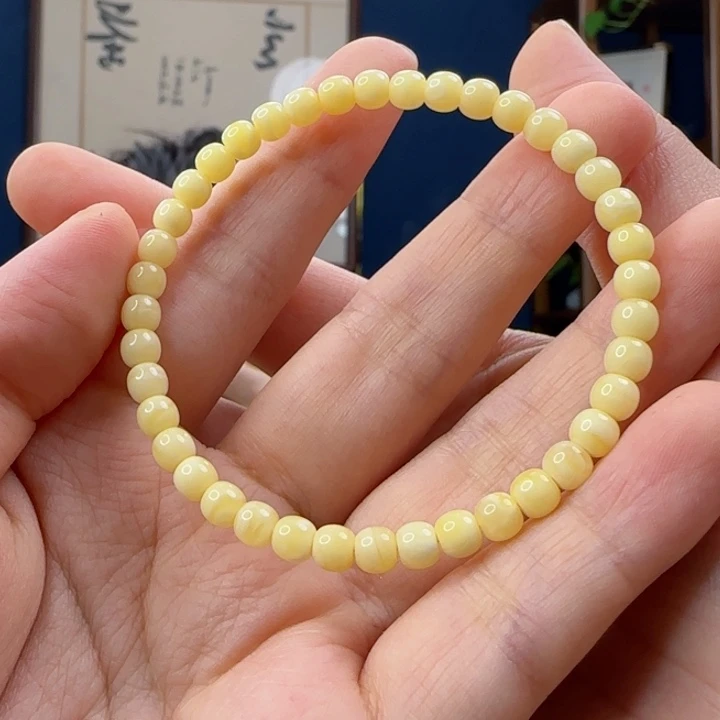 宁***宁未镶嵌蜜蜡手串1111111111