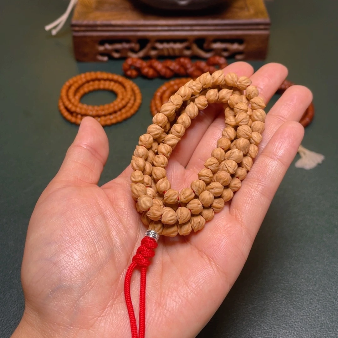 柏香籽/百香籽吊坠报喜鸟