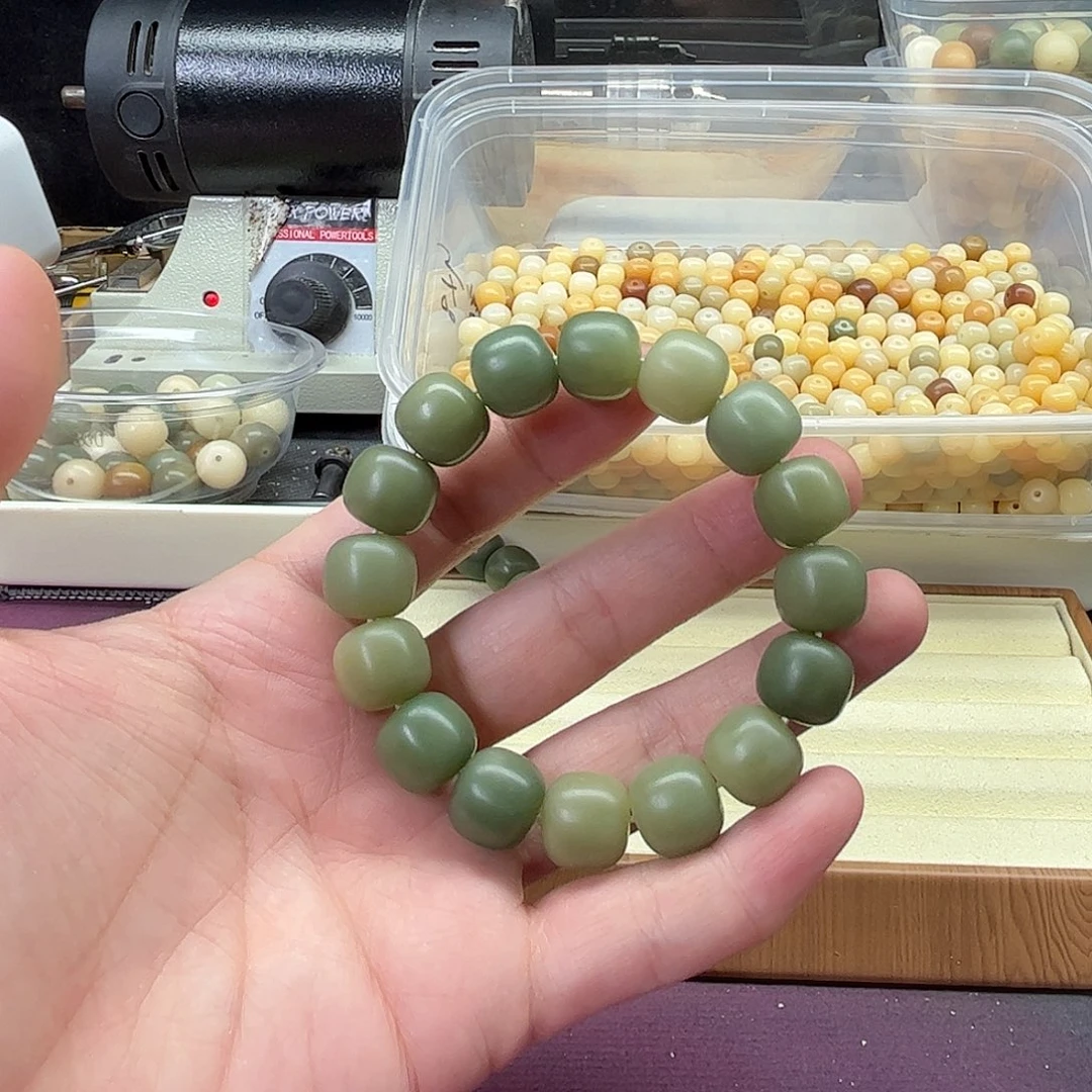 杏****菩提根/象牙果吊坠14×13砂纸干磨单圈阴皮山水色