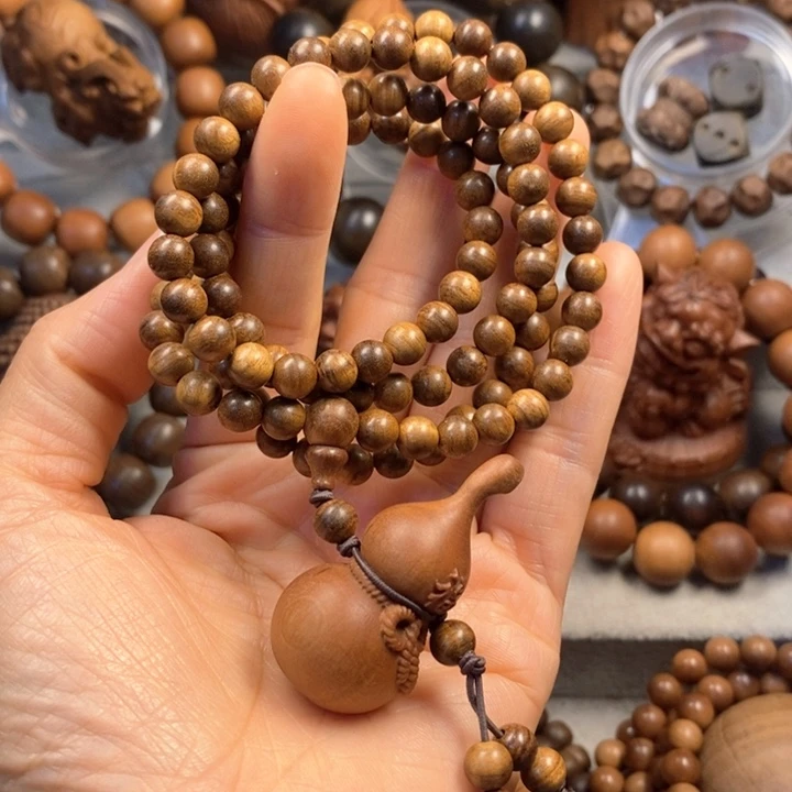 宝***贝檀香木手串/手链老山檀奶香味0.6黑肉带葫芦吊坠