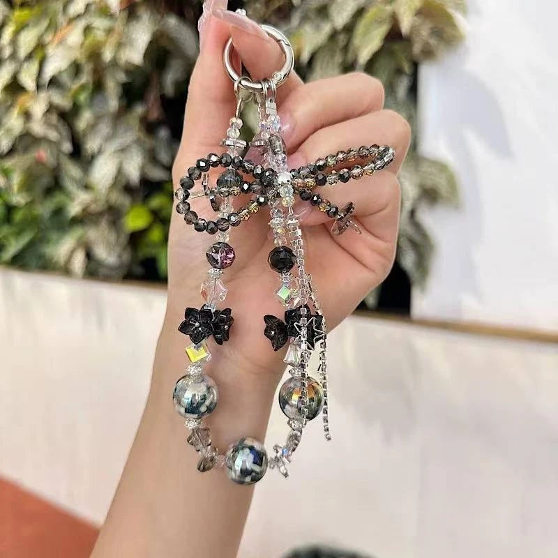 黑色水晶蝴蝶结串珠手机链ins轻奢高级感女款流苏挂链短款钥匙扣