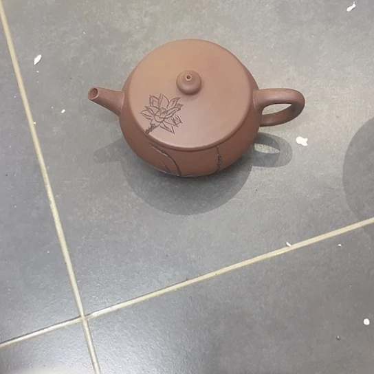 紫砂茶壶是的……是个