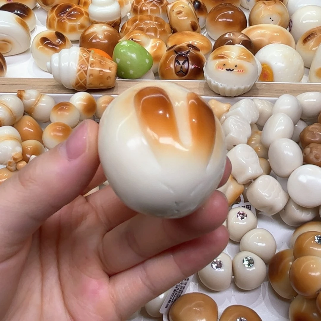 白玉菩提把件6.11.47象牙果把件兔子