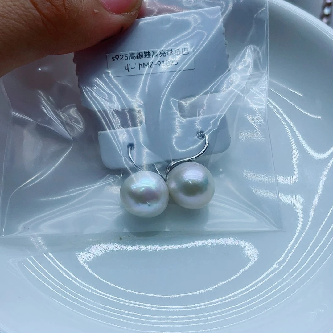 银S925镶嵌耳饰淡水珍珠吾*曼