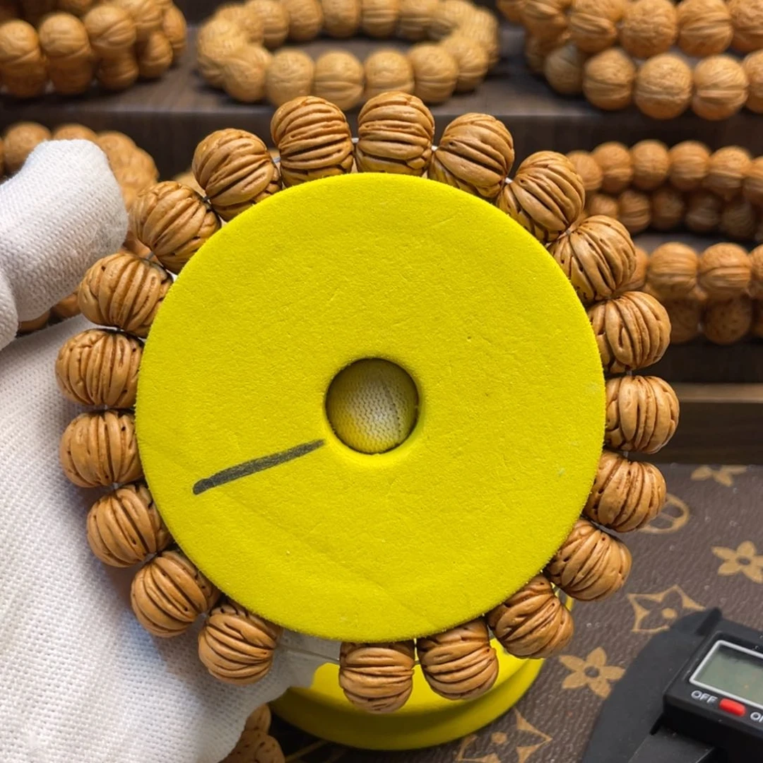 手串桃核李*长树王脐中脐