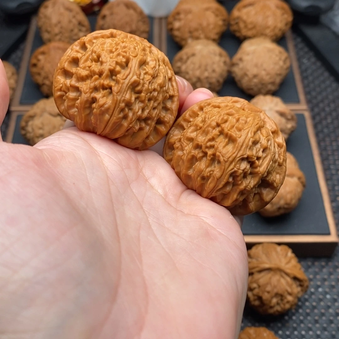 谁***眼把件文玩核桃白狮子