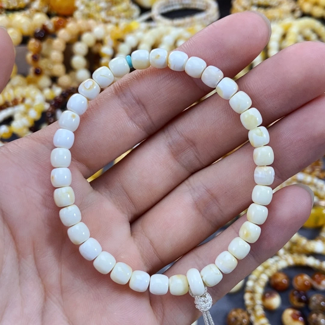 琥珀未镶嵌手链5.5mm漆白手持