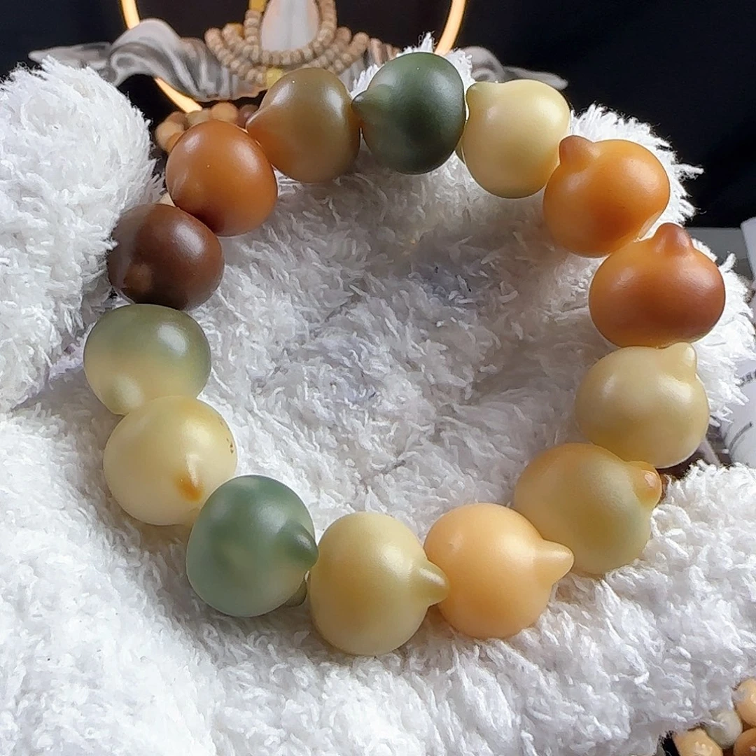 菩提根/象牙果手串川*?瑕疵卡18猫头手串一条