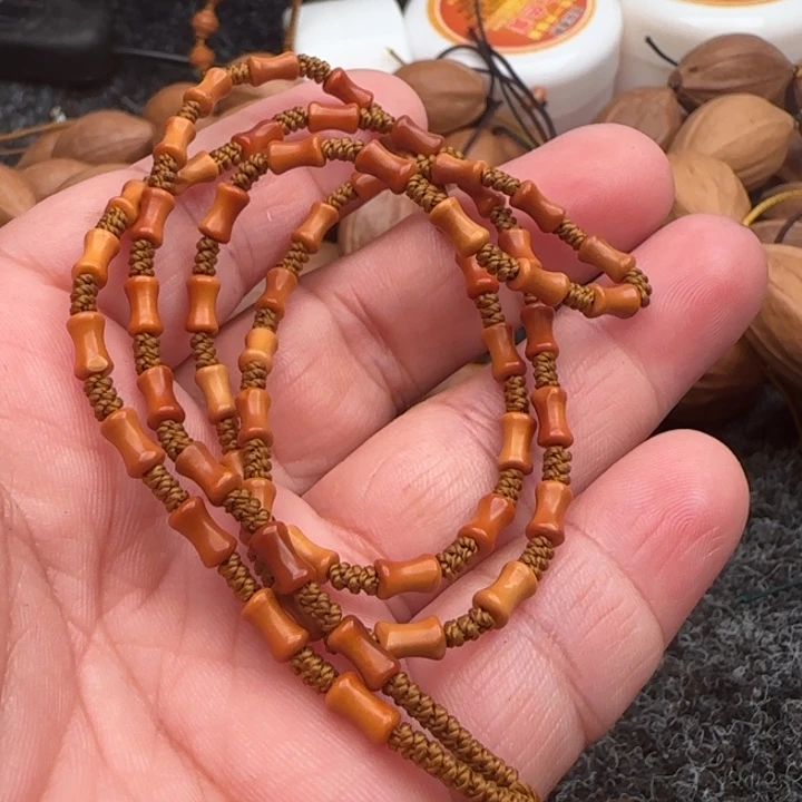 橄榄核手串二****德橄榄核雕工艺脖挂