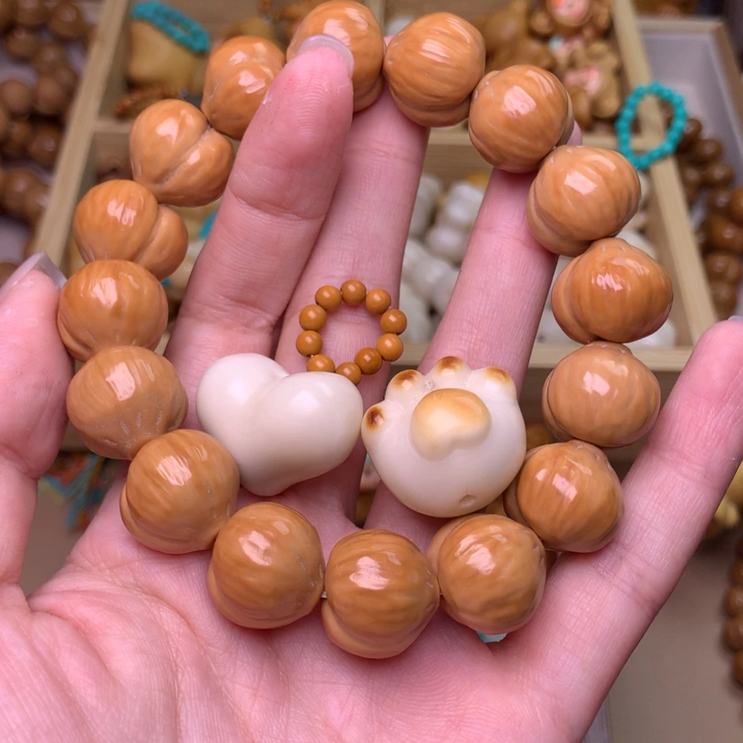 那****猴头核桃手串17手串爱心猫爪橄榄环