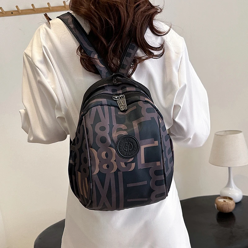 EVE2025新款贝壳包单肩斜挎双肩便携包百搭轻奢双肩包大容量