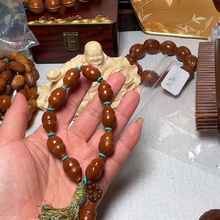 戳***脸橄榄核手串/手链葫芦