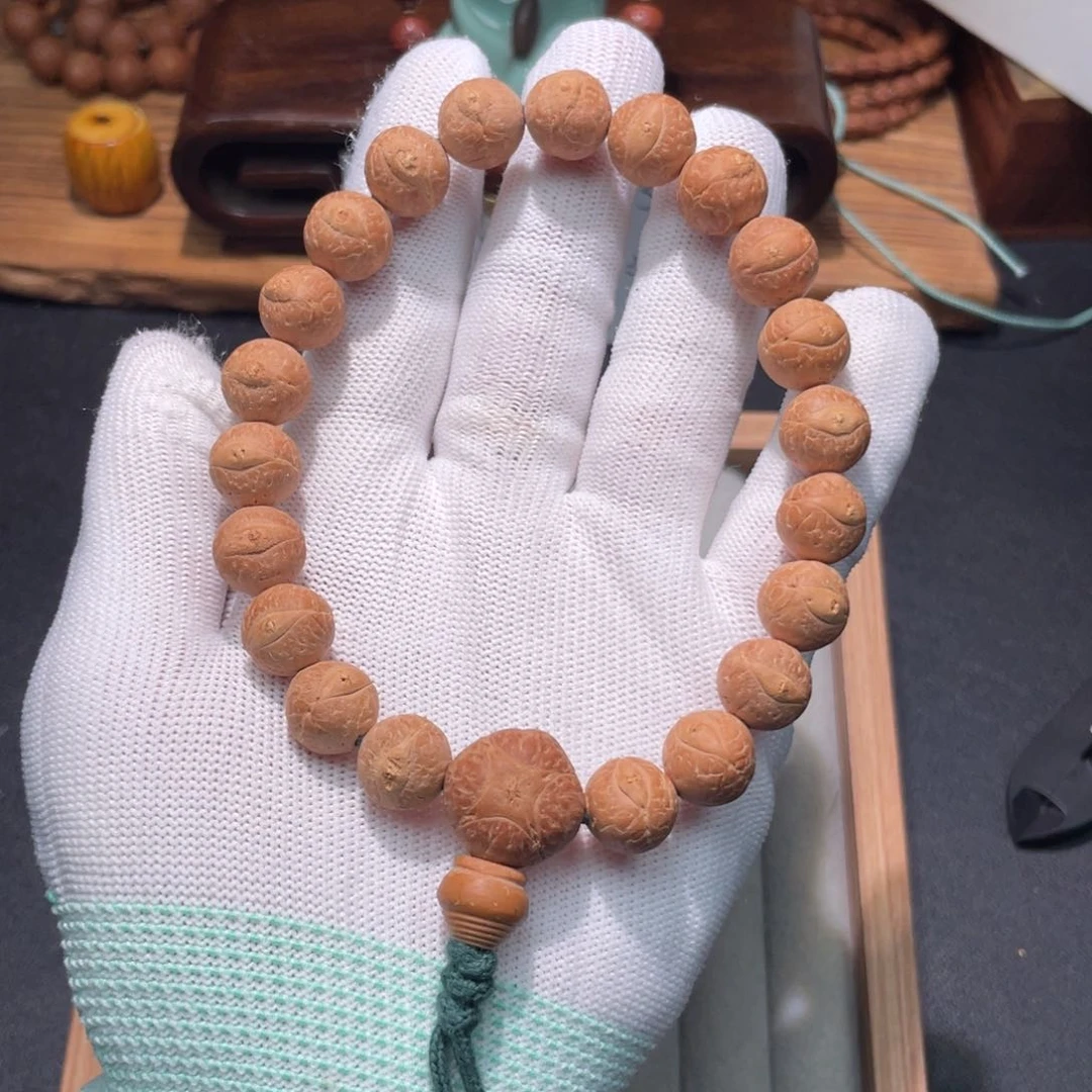 扎***、凤眼菩提手串02单仓矮圆玉化皮立体眼