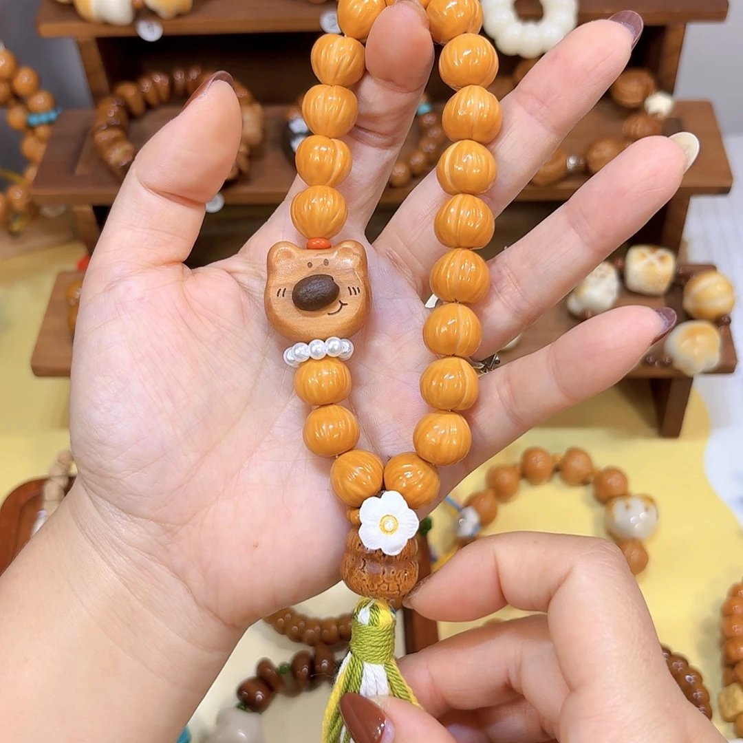 吊坠星月菩提全品猴头皮桃手持驼骨花花