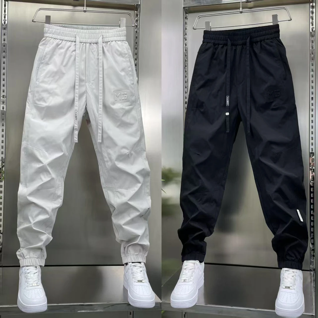 2025春秋季时尚拼接拉链绣标潮休闲卫裤抖音快手同款宽松小脚裤