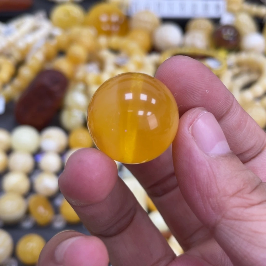 未镶嵌琥珀裸石22.2mm微瑕疵 焦皮