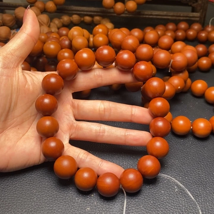 橄榄核吊坠1.75尺寸树王18颗微暇手持