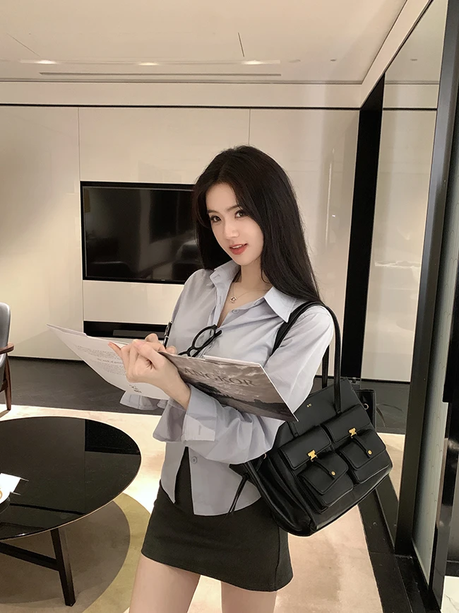 韩系褶皱收腰蓝色长袖衬衫女秋季2025新款高级感气质显瘦通勤上衣