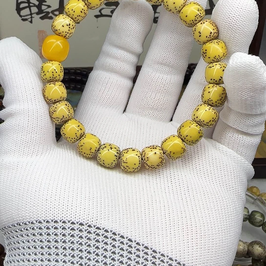 星月菩提手串卡9.5鸡油黄