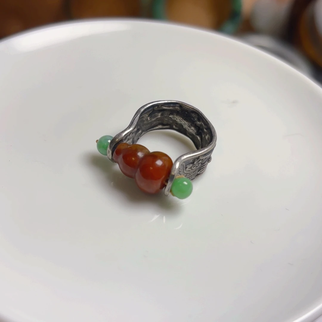 翡翠未镶嵌颈饰儒**戲林林